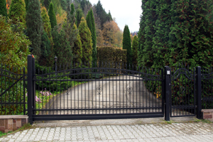 Swinging gate installed at driveway entrance